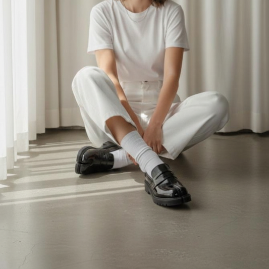 Classic black loafers in template style